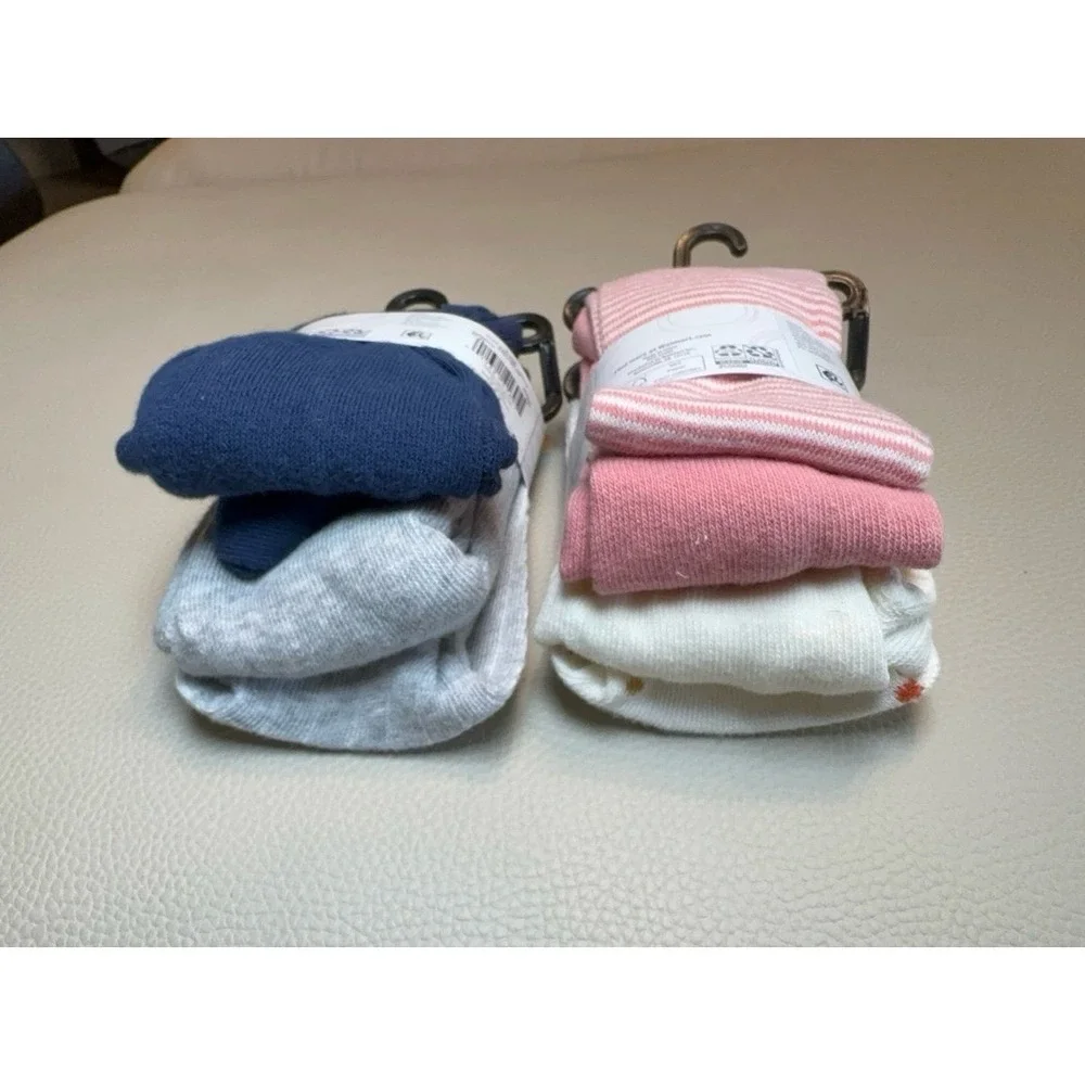 Four pairs of toddler girls cotton tights size 6-18 months.